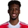K. Coman